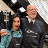 Los Angeles Natural History Museum's Master Taxidermist Tim Bovard and Master Taxidermist Allis Markham sporting "The Tim Sweater" our black Taxidermy Sweater and Allis sporting the Taxidermy Apron.